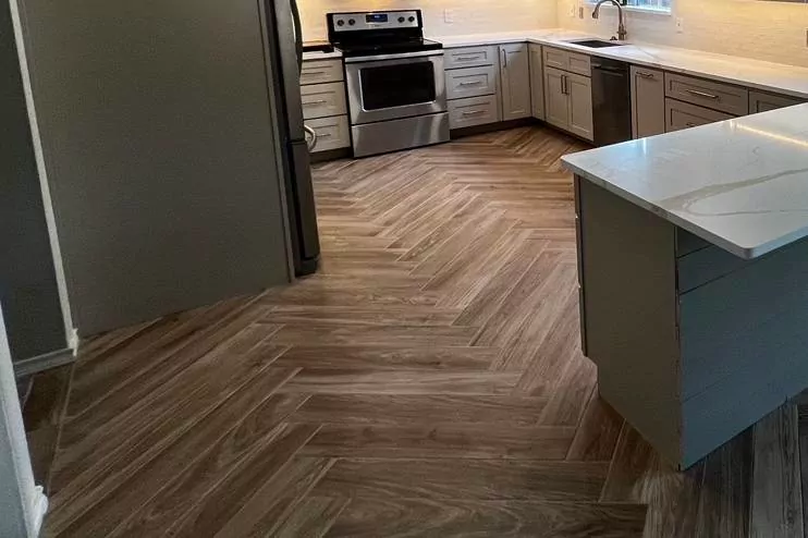 Herringbone wood-look flooring by The Flip Fixer