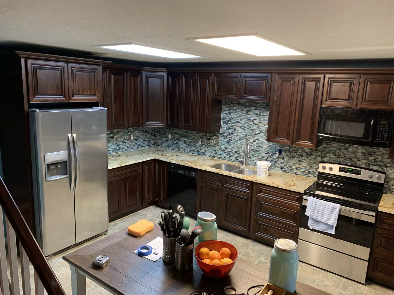 Dark wood kitchen by The Flip Fixer