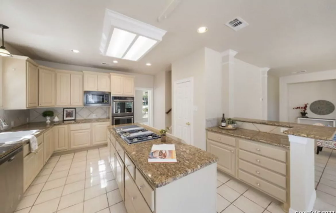 Cream kitchen by The Flip Fixer
