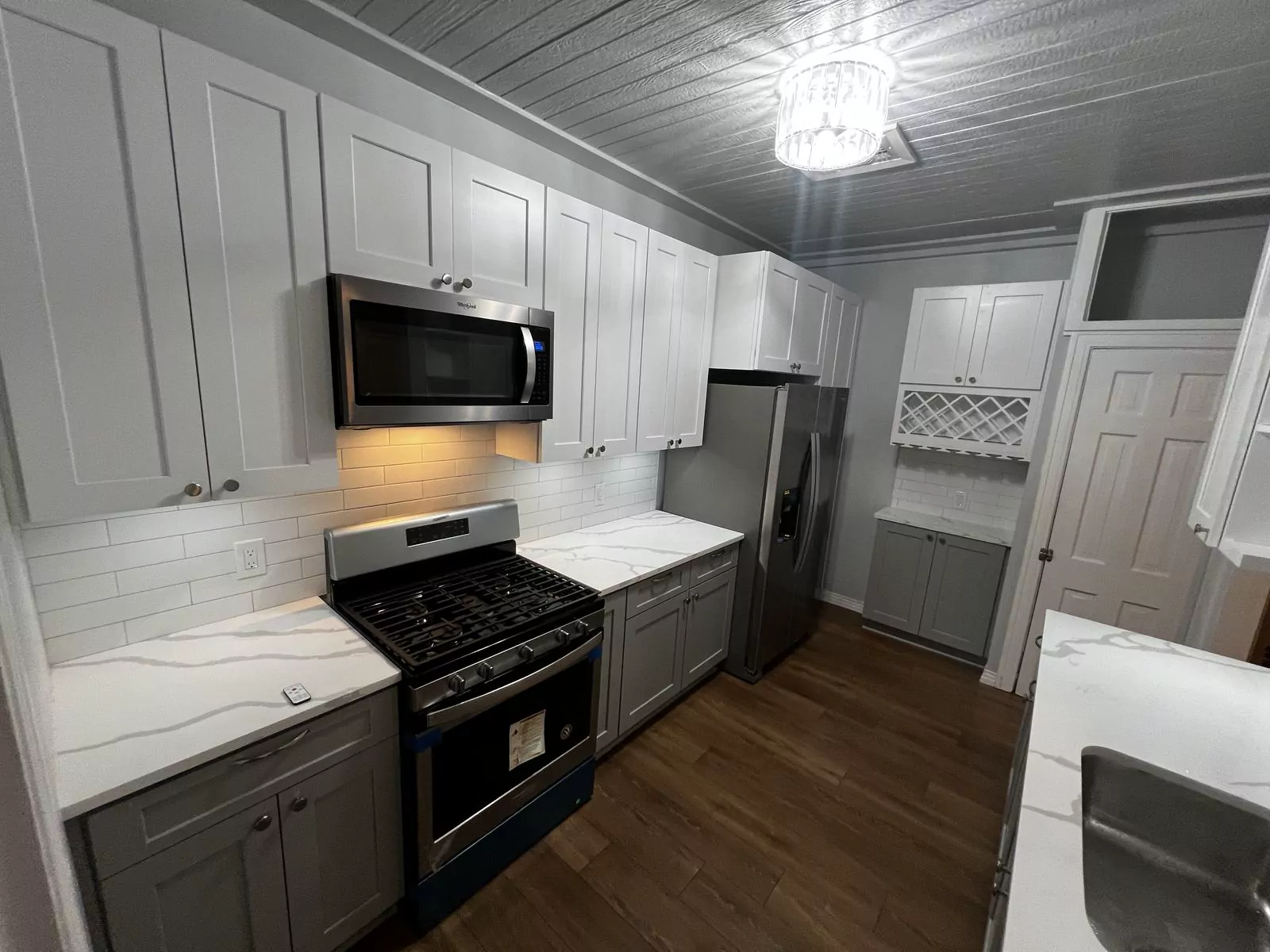 Gray and white kitchen by The Flip Fixer
