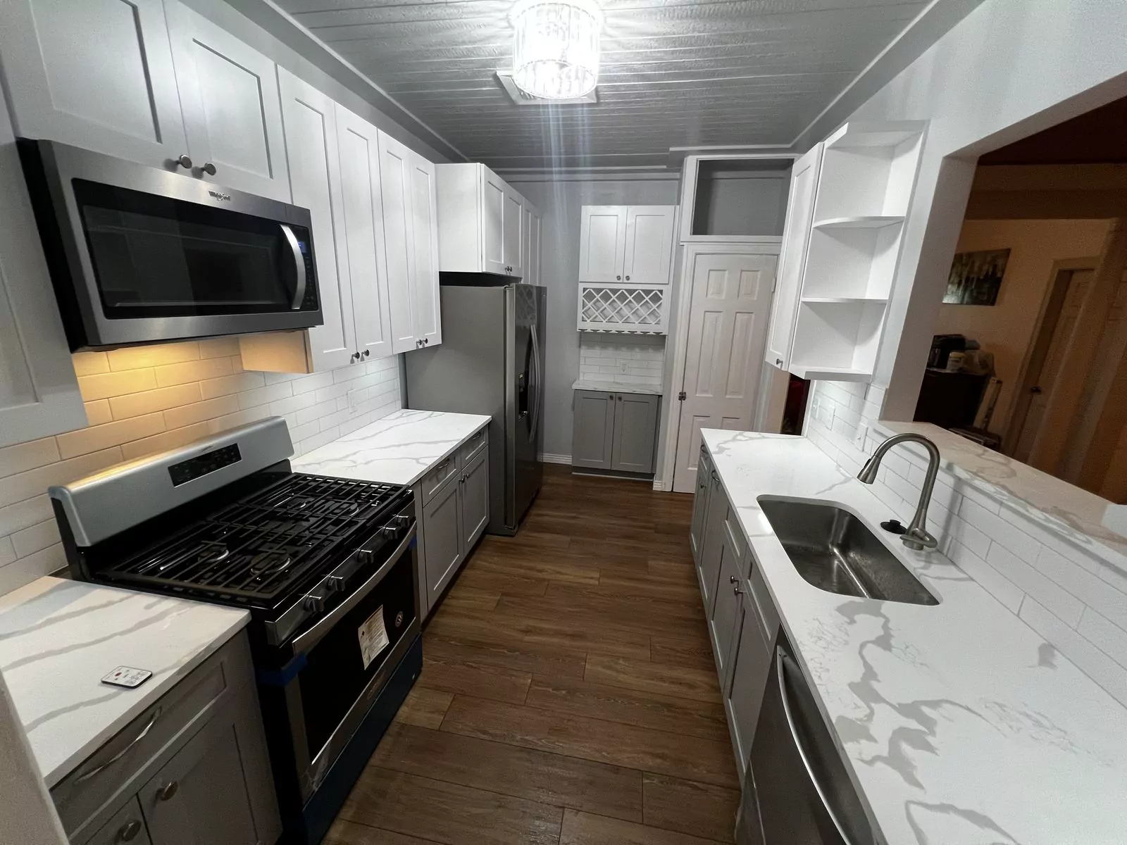 Gray and white kitchen by The Flip Fixer