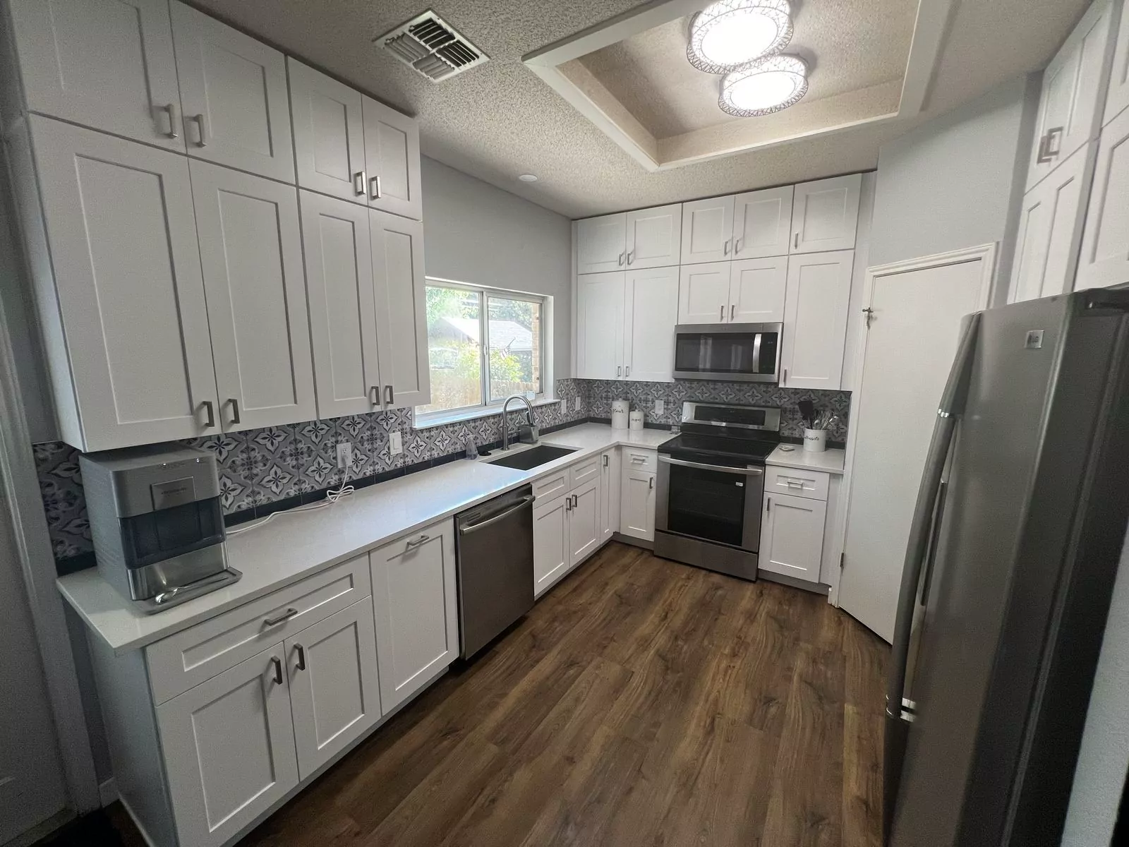 White shaker kitchen by The Flip Fixer