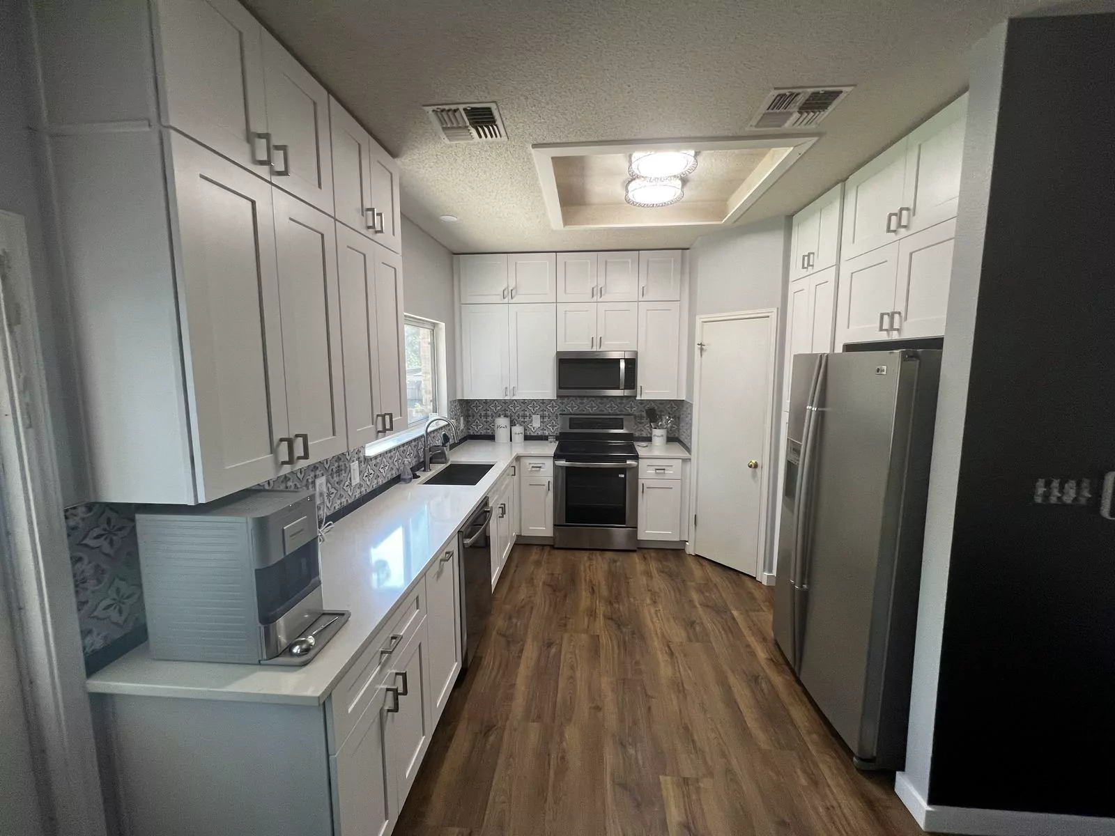 White shaker kitchen by The Flip Fixer