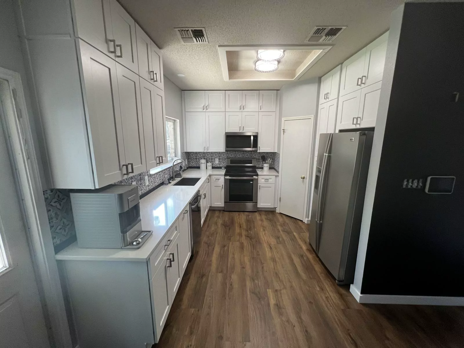 White shaker kitchen by The Flip Fixer