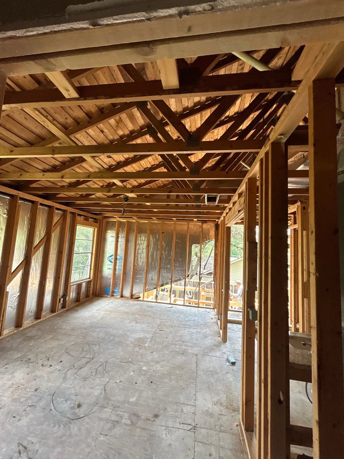 Open exposed framing during fire rebuild by The Flip Fixer