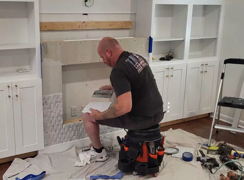 Make-ready fireplace tile install by The Flip Fixer